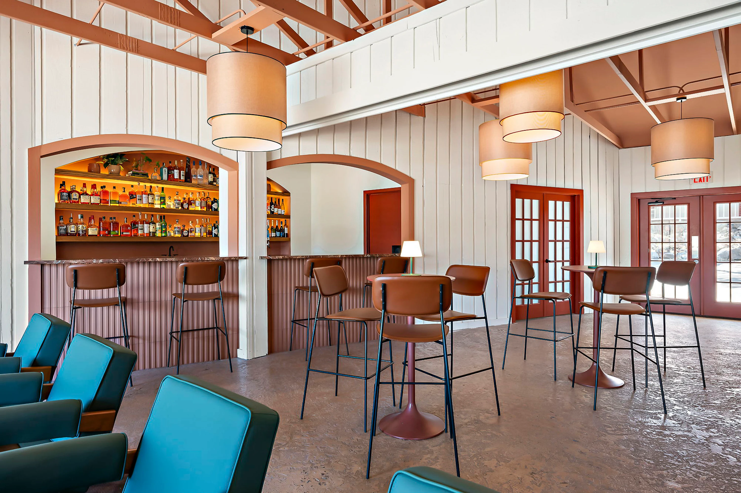 The bar under the pitched trusses at Del Sol, bar & restaurant in New Braunfels, Texas